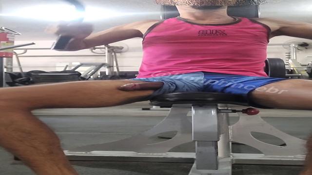 Hard cock sneaked out at the gym