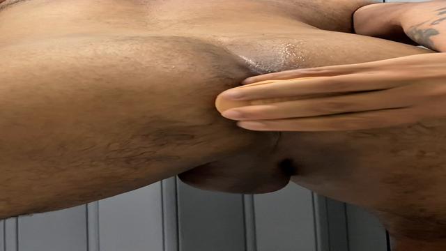 playing with a rubber dick