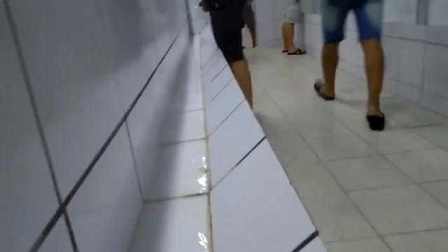 Straight brazilian men pissing at soccer stadium