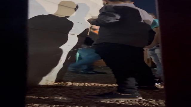 Brazilian men pissing in the street