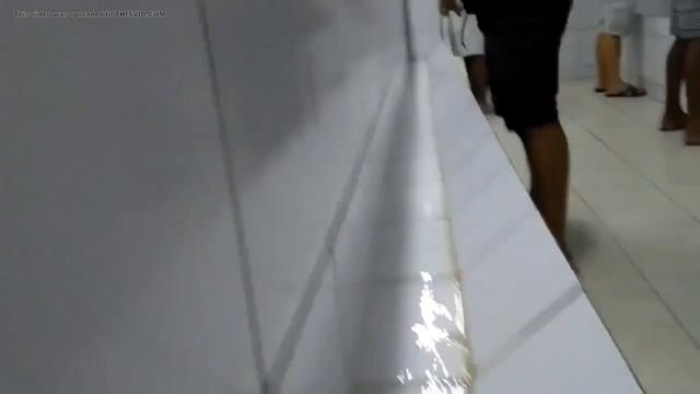 Straight brazilian men pissing at soccer stadium