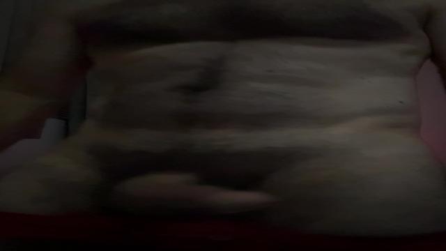 Exibindo o pauzão usando cueca vermelha 