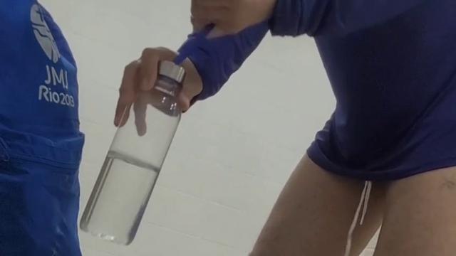 96 - Tall, muscular guy showing off in the locker room