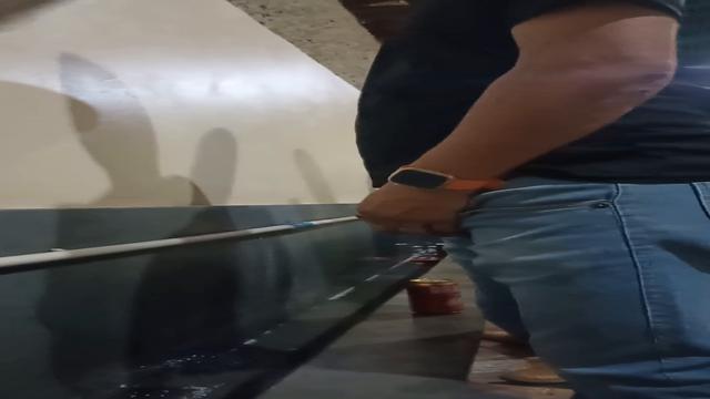 Brazilian men pissing at bathroom