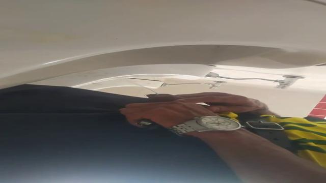 Brazilian men pissing at bathroom