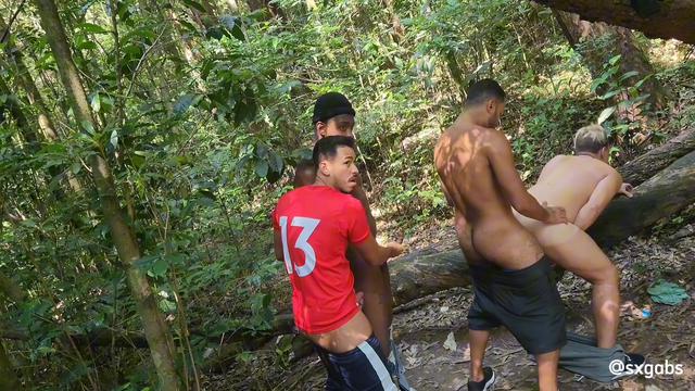 Taking turns fucking the kid's ass on the trail 