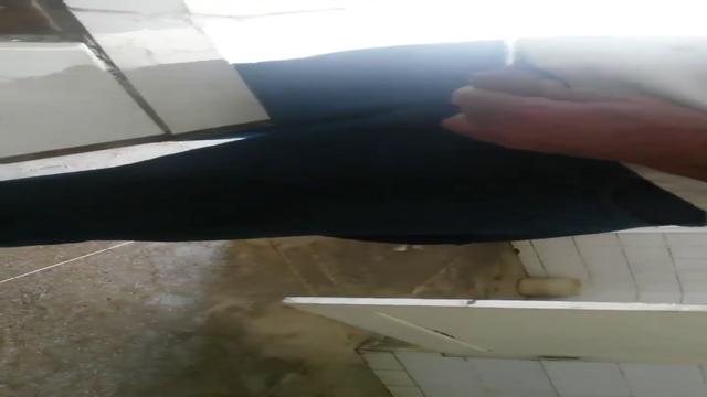 Brazilian men pissing at bathroom