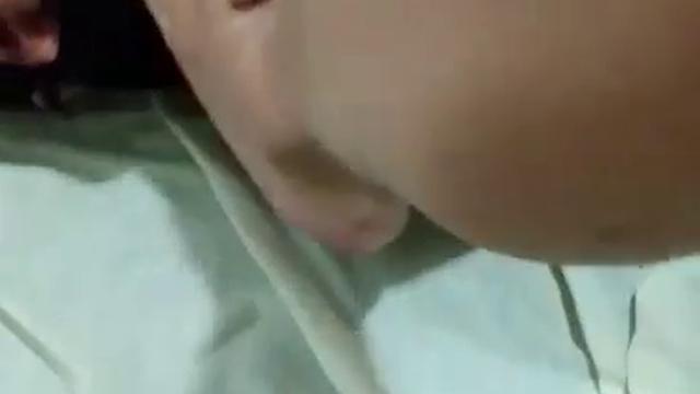 Male puts big foot for bitch to lick