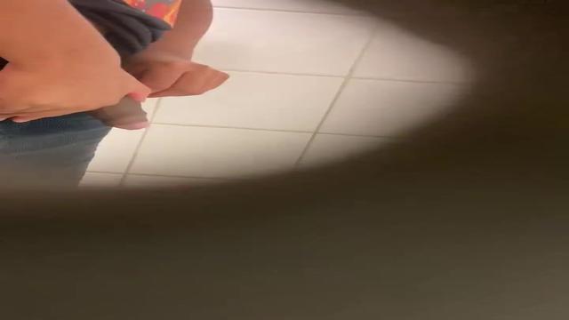 Brazilian men pissing at bathroom