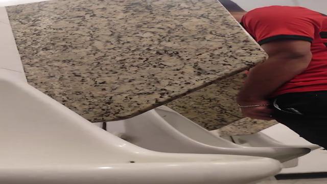 Brazilian men pissing at bathroom