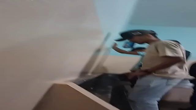 Brazilian men pissing at bathroom