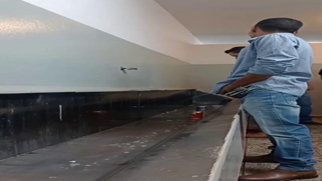Brazilian men pissing at bathroom