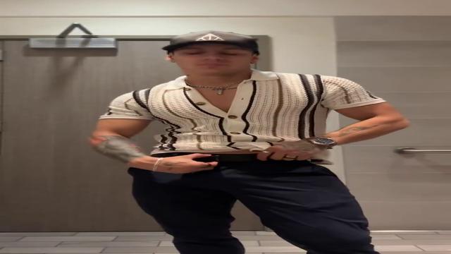 Roger Murcia showing just the tip of his penis.