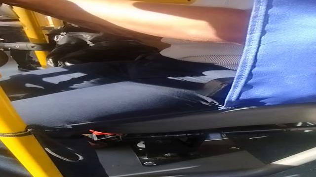 Going home after the party, I took this bus and noticed that the ticket collector was excited. 