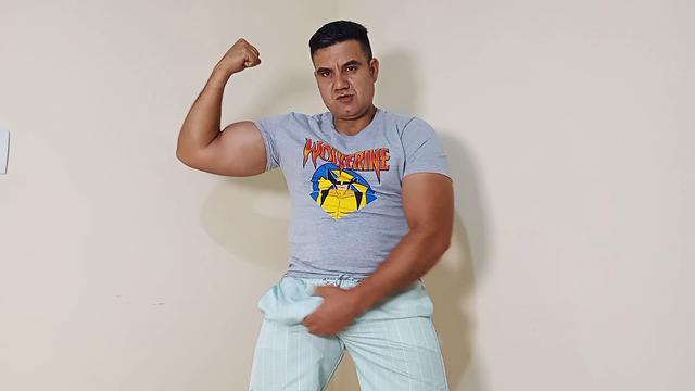 A muscular, horny man shows off on cam.